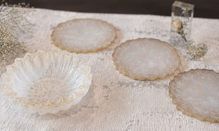 Crystal resin coaster set with gold rims and trinket bowl