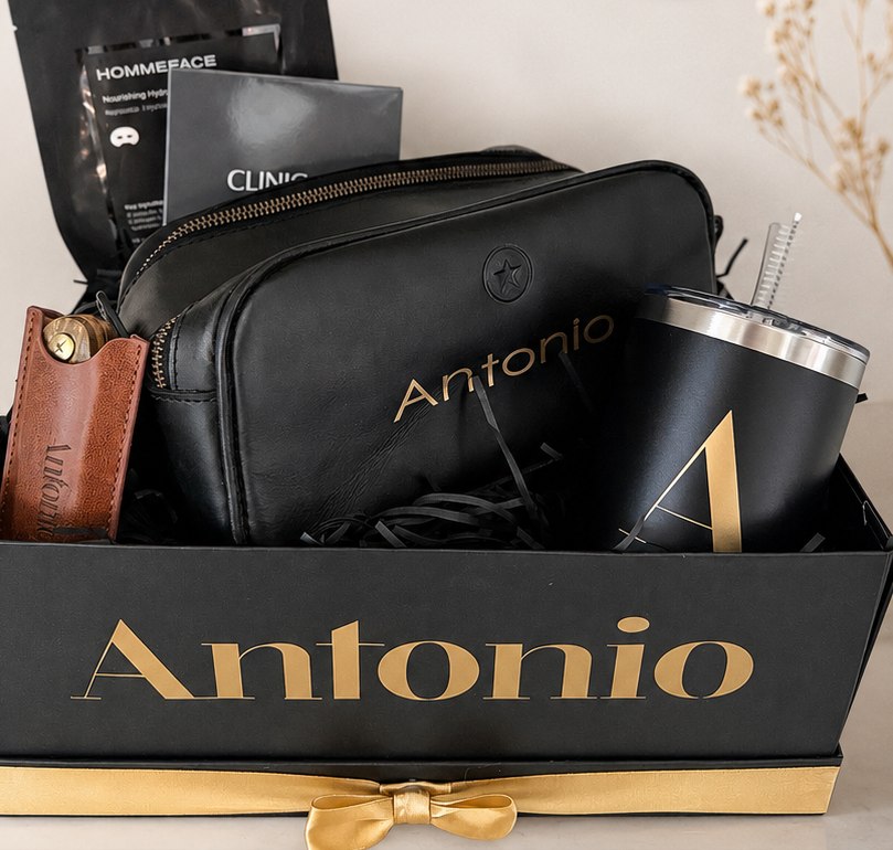 Personalized black and gold luxury gift box with curated essentials
