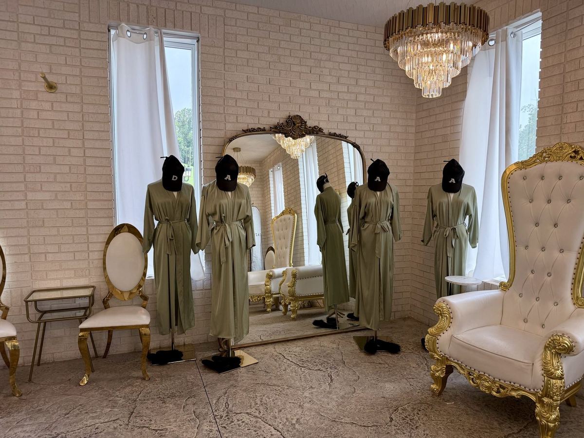 Styled bridal suite with robes and gold accents