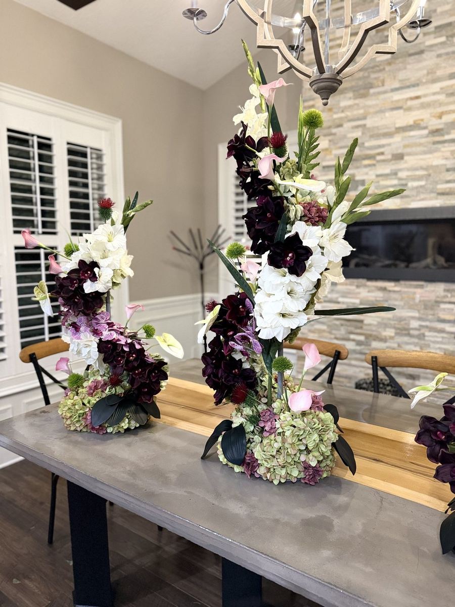 Statement floral arrangement in white, plum and green