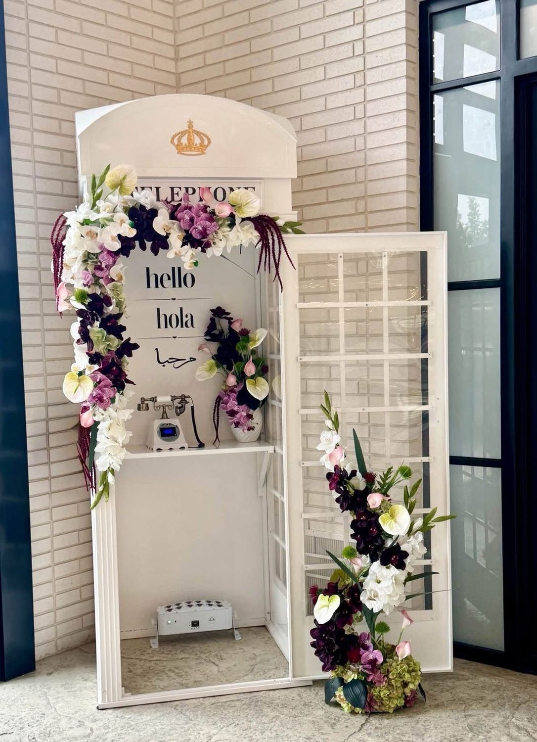 Vintage telephone booth audio guestbook dressed in florals
